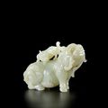 A pale green jade carving of two mythical beasts, Qing Dynasty
