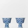 A pair of blue and white stem cups with ‘lanca’ characters, Qianlong six-character seal marks in underglaze blue in a line and o