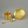 Tasse et sa soucoupe et cuillère en or 22 ct, Chine, vers 1900.
