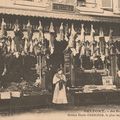 Quid de la date de ce cliché (CPhoto) de ce commerce, Aux Halles Parisiennes, situé au 40 du faubourg de France, à Belfort ?