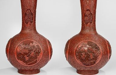 A fine and large pair of carved cinnabar lacquer vases with figural scenes from the Sanguo yanyi, Qianlong-Jiaqing period