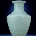 A magnificent and rare celadon-glazed archaistic vase, Hu, Qianlong six-character seal mark and of the period (1736-1795)