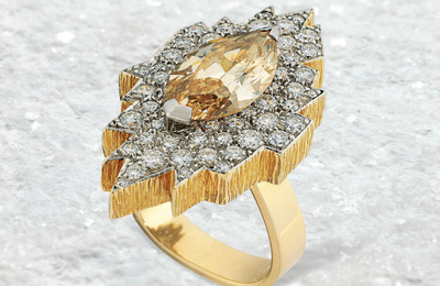 A 5.25 carats Fancy Brown-Yellow marquise-cut diamond and diamond ring, by Andrew Grima