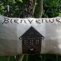 Coussin de porte bienvenue