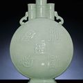 A superb large celadon-glazed tripled-neck moonflask. Yongzheng six-character sealmark and of the period (1723-1735). 