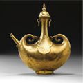  Deccani gilt metal pilgrim flask, India, 16th/ 17th century