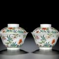 A pair of famille-rose 'poppy' teabowls and covers, seal marks and period of Daoguang (1821-1850)