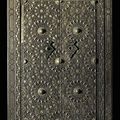 A pair of massive Mamluk revival silver and gold inlaid brass overlaid wooden doors  Signed Elias Hatoun, Egypt, 1906 A.D.