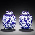 A pair of blue overlay Peking glass oviform vases. 18th/19th century