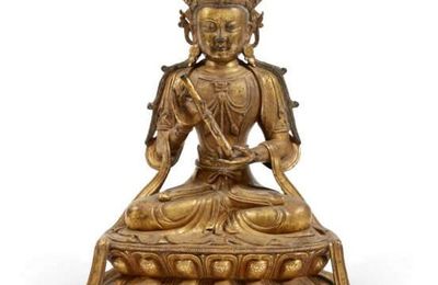 A gilt-bronze figure of Manjushri, Ming dynasty, 16th-17th century