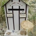 Une urne de mariage en cabine de plage