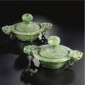 A Pair of Mughal-style spinach-green jade censers and covers. 20th century