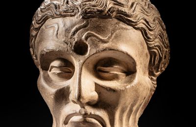 An extremely rare grey schist head of the ascetic Siddhartha, Ancient region of Gandhara, 2nd / 3rd century