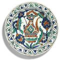 An Iznik polychrome pottery dish with ewer, Turkey, early 17th century
