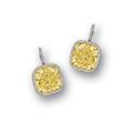 Pair of fancy intense yellow diamond and diamond earrings