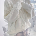 Zoom sur le retour du pull torsadé, Moins ringard