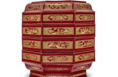 An early red and engraved gilt (qiangjin) lacquer three-tier octagonal box and cover, Song-Yuan Dynasty