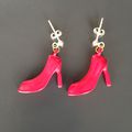 Des" l*ouboutin" aux oreilles