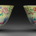 A pair of famille rose yellow-ground sgraffiato bowls, Guangxu six-character marks in underglaze blue and of the period 