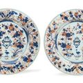 A very large pair of Chinese Imari armorial dishes, Kangxi period, circa 1705