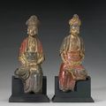 Two polychromed iron seated figures of Guanyin. Ming Dynasty