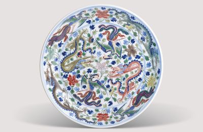 A famille verte 'dragon and phoenix' dish, Kangxi six-character mark in underglaze blue within a double circle and of the period (1662-1722)