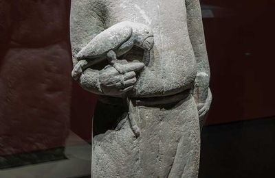 Stone Figure of Man holding a parrot, Tang dynasty, 7th Century