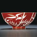   A fine coral-red reverse-decorated 'bamboo' bowl, seal mark and period of Qianlong