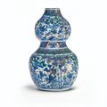 A blue and white and polychrome enamelled double-gourd vase, Ming dynasty, 16th century