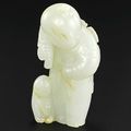 An exceptional white jade 'Boy and Cat' group, Qing dynasty, 18th century