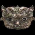 An archaistic gold and silver-inlaid bronze fitting, Song to Ming dynasty