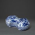 A rare blue and white ingot-shaped 'dragon' box and cover, Mark and period of Wanli