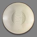 A Dingyao dish with molded decoration. Jin Dynasty