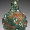 A large iron-red-decorated green and white-enameled carved vase, tianqiuping, 18th-19th century