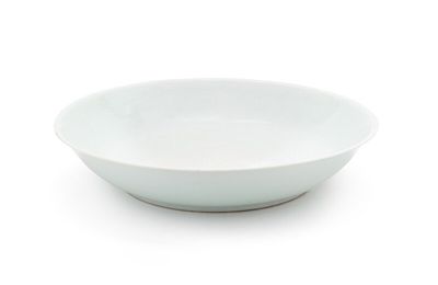 A rare large Ming-style white-glazed incised 'lotus' charger, Mark and period of Kangxi (1662-1722)