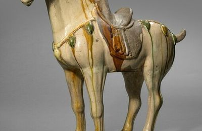 A fine sancai-glazed pottery figure of a Ferghana horse, Tang dynasty (618-907)