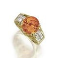 Mandarin garnet and diamond ring