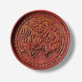 An imperial polychrome lacquer carved 'dragon and phoenix' dish, Wanli mark cyclically dated Yiwei year, corresponding to 1595, 