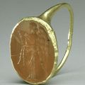 Gold ring with carnelian intaglio: winged Nemesis. Imperial Period. 1st–early 3rd century A.D.