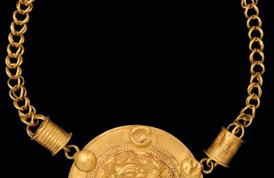An Egyptian gold necklace with medallion of Medusa, Roman period, circa 3rd century A.D.