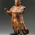 A gilt-lacquered wood figure of an attendant deity, Ming dynasty (1368-1644)