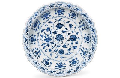 A blue and white 'floral scroll' barbed-rim dish, Yongle period (1403-1425)