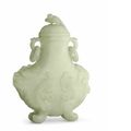 A pale celadon jade 'mythical beast' vase and cover, 19th century