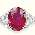 A fine oval-shaped ruby and diamond ring