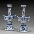 A pair of blue and white porcelain pricket candle stands. Jiaqing Mark and Period