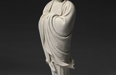 A magnificent and extremely rare Dehua figure of standing Damo, Ming dynasty, 17th century, impressed He Chaozong mark within a double gourd