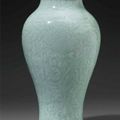 A celadon-glazed carved baluster vase, China, Qing dynasty, Kangxi period (1662-1722) 