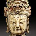A monumental wooden head of Guanyin. China, Ming dynasty.