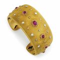 A gold, ruby and diamond cuff bracelet, by Buccellati