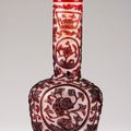 A red glass overlay bottle, Incised Qianlong four-character mark and of the period (1736-95)